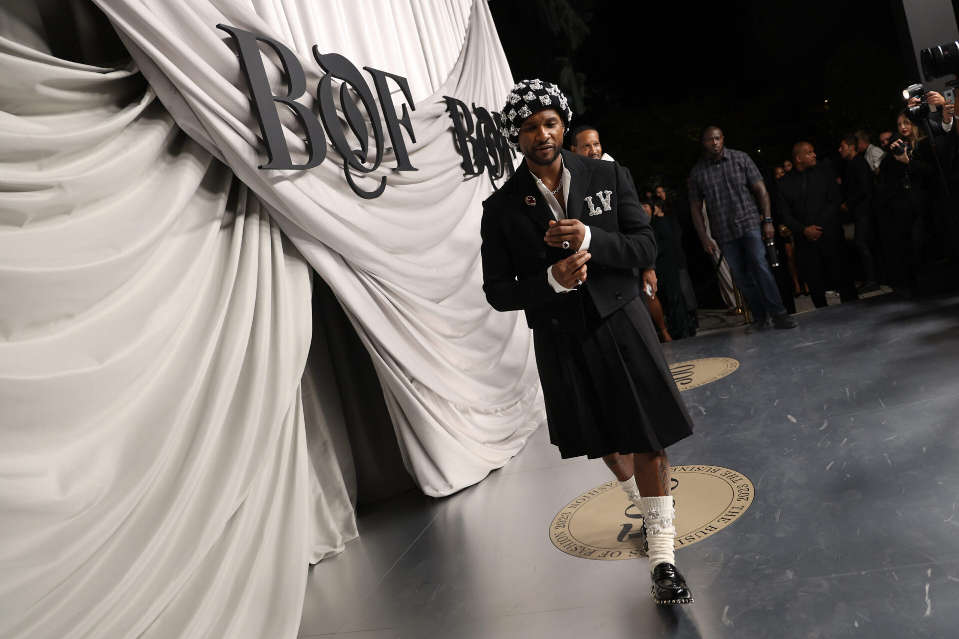 Usher Slays At BOF 500 Event wearing LV Designed By Pharrell