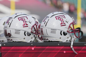 Temple U's Black AD not supportive of NIL deals, causing financial difficulty for school.