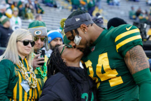 Simone celebrates Jonathan's first NFL touchdown on Thanksgiving Day.