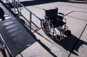 Federal investigation launched after video of airport workers damaging wheelchair goes viral.