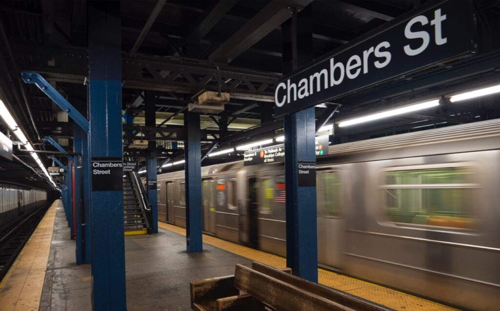 Man in New York arrested for pushing girlfriend onto subway tracks.